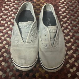 Grey shoes and grey fuzzy socks